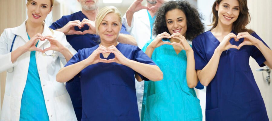 group-doctors-with-heart-symbol-1536x1047